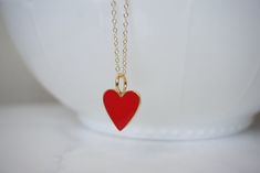 "Dainty Heart Necklace Pendant Anniversary Valentine's Day Your love Gift for Mom Gift for wife -Details Heart - .75\" or 19.mm brass and red enamel, the back is gold and blank, not double sided Chain - 14kt gold filled link chain Length - 14 - 40\" -How to Order Please select the chain Length from the first drop down menu The standard length is normally 18\" For multiple necklace purchases please send us a quick email for pricing and availability -Questions Remember photos can make pieces look Red Dainty Jewelry For Mother's Day, Dainty Red Charm Necklace For Valentine's Day, Red Charm Necklaces For Mother's Day Gift, Red Charm Necklace For Mother's Day Gift, Dainty Red Necklace For Anniversary, Valentine's Day Red Charm Necklace, Dainty Red Personalized Charm Necklaces, Dainty Personalized Red Charm Necklaces, Dainty Red Personalized Necklaces