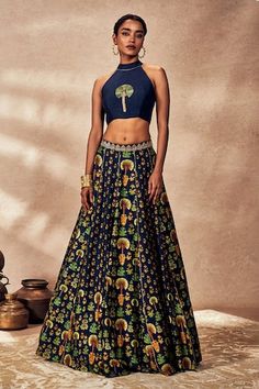 Blue kalidar embroidered waistband lehenga with all over Nomadic tribe digital print. Paired with a sleeveless halter neck blouse with palm tree embroidery at the centre and adorned with kinari. - Aza Fashions Palm Tree Embroidery, Halter Neck Blouse, Lehenga Pattern, Halter Neck Blouses, Tree Embroidery, Raw Silk, Set For Women, Aza Fashion, Halter Neck