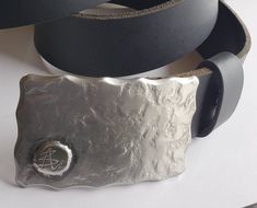 "Belt Buckle with either your initial on the front or artist's signature. Signed original belt buckle. Silver hand forged buckle with bronze  signature, or silver.  Hypoallergenic stainless steel buckle fits 1.5\" belt for jeans. Favourite us on Etsy to get the latest...hot off the anvil! https://www.etsy.com/ca/shop/ironartcanada Each buckle comes with it's own gift bag.  Choose from black velvet or beige burlap at the time of purchase. Hypoallergenic buckle. Buckle measures 3-1/4\" x 2\" . Han Handmade Adjustable Belt Buckles As Gift, Handmade Adjustable Belts For Gifts, Handmade Adjustable Belts As A Gift, Vintage Belt Buckles With Belt For Gift, Artisan Engraved Belt Buckles For Gifts, Artisan Engraved Belt Buckles As Gift, Adjustable Artisan Belts For Gifts, Artisan Adjustable Belts As Gifts, Adjustable Artisan Belt As Gift