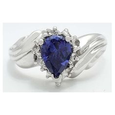 Material: 14k Solid White Gold (Not Plated Or Overlaid) Gem Type: 1 Created Tanzanite - 1.10 Carats Tanzanite Grades Hue . . . Violetish/Blue With Red Flashes Tone . . . Medium Dark Saturation . . . Vivid No Inclusions Or Flaws 3 Natural Diamonds - 0.015 Carats Each Diamonds Grades, Color . . . Hi Clarity . . . I1 Shape: Pear & Round Type Of Setting: Prong Size: 7 (Free Resizing Service Available - If Needed) Fine Jewelry Tanzanite Rings With Diamond Cut, White Gold Tanzanite Rings With Diamond Cut, Formal Tanzanite Birthstone Ring With Accent Stones, Formal 14k Gold Pear-shaped Sapphire Ring, Formal Tanzanite Birthstone Ring, Formal Vvs Clarity Pear-shaped Sapphire Ring, Formal Pear-shaped Sapphire Ring With Vvs Clarity, Teardrop Hallmarked Ring For Anniversary, Hallmarked Teardrop Anniversary Ring