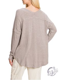 Casual v-neck long sleeve top. Features a drop shoulder for a relaxed look. Lightweight fabric makes this shirt easy to wear inside and outside the home. Fabric: 49% Polyester, 36% Cotton, 11% Acrylic, 4% Spandex Relaxed V-neck Tops For Fall, Fall Long Sleeve V-neck Top, Fall Relaxed Fit Long Sleeve V-neck Top, Relaxed Fit Long Sleeve V-neck Top For Fall, Relaxed Fit V-neck Top For Fall, Oversized Comfortable V-neck Top, Casual Oversized V-neck Sweater For Loungewear, Long Sleeve Cotton V-neck Top For Fall, Casual V-neck Sweater For Loungewear