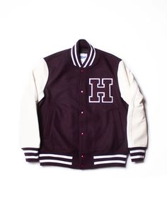 a maroon and white varsity jacket with the letter h on it's chest, in front of a white background