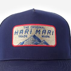 Embroidered logo detail Snapback closure for custom fit Unisex design Timeless style Sunny skies and weekend plans call for a Hari Mari Range Trucker hat. With a snapback closure and custom fit, these classic hats are a must-pack. Free shipping on orders over $80. All Hari Mari products are carefully crafted from premium materials. Do: spot clean with mild soap and a damp cloth Don't: use bleach or harsh chemicals Outdoor Trucker Hat With Curved Brim And Custom Logo, Outdoor Trucker Hat With Custom Logo And Curved Brim, Trucker Snapback Hat With Flat Bill For Travel, Outdoor Trucker Hat With Flat Brim And Logo Patch, Outdoor Snapback Trucker Hat With Custom Logo, Flat Brim Trucker Hat With Logo Patch For Outdoor, Curved Bill Hat With Custom Logo For Outdoor, Outdoor Flat Bill Hats With Custom Logo, Snapback Hats With Custom Logo For Outdoor