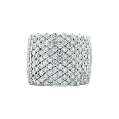 18K white gold classy band ring is from Dentelle Collection. This piece of jewellery is made from natural white diamonds in total of 7.37 Carat. Total metal weight is 20.60 gr. 1.8 cm wide. Great for any occasion! Dentelle Collection draws its inspiration from lace and its natural elegance presented through complex manufacturing techniques using white gold thread embroidered and diamonds. This combination captures and reflects the light recreating the hexagonal shapes of French lace. It is suppo Luxury Wide Band Diamond Ring With Diamond Cut, Luxury Wide Band Diamond White Diamond Ring, Luxury Diamond Wide Band Wedding Ring, Diamond White Diamond Ring With Wide Band And Accents, Fine Jewelry Diamond Wide Band Ring, Luxury Wide Band Diamond Cut Ring, Luxury Diamond Wide Band Ring With Round Cut, Dazzling Wide Band Diamond Ring, Luxury Wide Band Diamond Ring With Round Cut