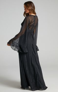 Complete your look with the Dangerous Woman Maxi Dress in Black from Showpo USA. Fast US Shipping Available & Extended Returns. Sheer V-neck Maxi Dress For Evening, Sheer V-neck Maxi Dress For Formal Occasions, Sheer V-neck Maxi Dress For Cocktail, Chic Bell Sleeve Maxi Dress For Party, Sheer V-neck Maxi Dress For Date Night, Flowy Maxi Dress With Sheer Sleeves For Party, Sheer Long Maxi Dress For Evening, Flowy Sheer Maxi Dress For Party, Evening V-neck Maxi Dress With Ruffles