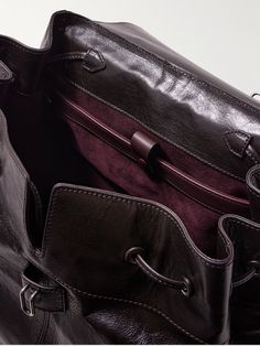 Métier's 'Glide' backpack is such a sleek way to carry the essentials, whether you're headed to the office or airport. Handcrafted in Italy from panels of glossy full-grain leather, it's stamped with the label's logo and can be carried by the sturdy top handle or adjustable shoulder straps. It has a laptop sleeve along with plenty of pockets to keep your keys, phone and wallet organised. Designer Leather Backpack For Business With Adjustable Strap, Designer Leather Backpack With Adjustable Strap For Business, Luxury Backpack With Leather Backing, Classic Backpack With Detachable Strap, Luxury Leather Backpack With Detachable Strap For Travel, Luxury Leather Satchel Backpack For Travel, Designer Leather Backpack With Detachable Strap For Travel, Luxury Leather Backpack With Adjustable Strap For Business, Leather Backpack With Adjustable Strap For Business Trips