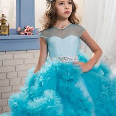 Make your girls look like a princess on their special day with this beautiful dress. This Layered Lace Ruffle and Rhinestone Design Princess Ball Gown is a perfect dress for girls. It can be worn on any occasion or special event. Features: Layered lace ruffle design. Sleeveless design. Long dress. Comfortable to wear. Fabric & Care: Made of high-quality cotton fabric, polyester, and mesh. Machine washed preferred. Do not bleach. Size Chart (INCHES):Please order 1 size bigger for better fit and c Quinceanera Princess Ball Gown Dresses, Princess Style Quinceanera Ball Gown Dress, Princess Quinceanera Ball Gown With Ruffles, Quinceanera Princess Dress With Ruffles, Ruffled Ball Gown Princess Dress For Quinceanera, Princess Dress With Fitted Bodice For Quinceanera, Fitted Bodice Princess Dress For Quinceanera, Fitted Princess Dress For Quinceanera, Princess Style Dress With Fitted Bodice For Quinceanera