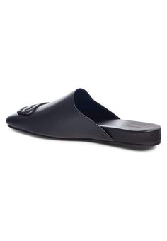 These black Balenciaga BB logo leather slipper shoes feature a square toe, slip-on design, flat sole and BB logo plaque.Calfskin leather with leather soleRubber tap heelMatte black-tone BB logo detail Composition: Leather 100%Lining Composition: Leather 100%Sole Composition: Leather 100% Fits true to sizeMade in Italy Bb Logo, Black Balenciaga, Balenciaga Black, Leather Slippers, Slipper Shoes, Embossed Leather, Shoes Online, Sale Items, Slip On Sneaker