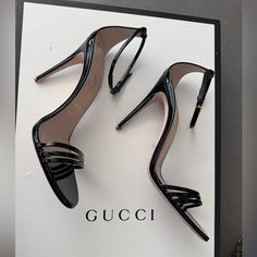 A Classic Silhouette, The Heeled Sandal Is Presented For The Latest Gucci Collection In Shiny Patent Leather. Ankle Closure With Adjustable Buckle And Leather Sole. Had Taps Replaced For More Stability. (New Taps Included With Heel) 3in Heel. Gucci Black Sandals With Single Toe Strap, Chic Gucci Sandals With Single Toe Strap, Gucci Open Toe Heels With 4-inch Heel, Modern Gucci Sandals For Evening, Modern Gucci Evening Sandals, Gucci Ankle Strap Sandals For Formal Occasions, Gucci Sandals With Heel Strap For Formal Occasions, Gucci Open Heel Sandals For Evening, Gucci Formal Sandals With Heel Strap