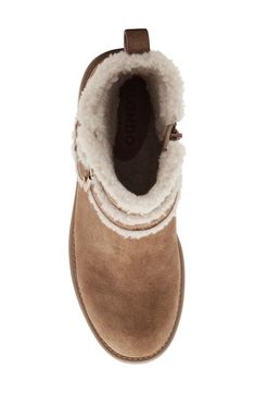 A plush faux-fur lining and exterior trim provide texture and warmth to a waterproof bootie grounded by a grippy, traction-enhancing sole. 3 1/2" heel; 1" platform; 2 1/2" slope Waterproof: protects against rain, puddles and slush to keep feet dry in wet conditions
 4 3/4" shaft Leather upper/textile faux-shearling lining (China)/rubber sole
 Imported Exterior Trim, Fur Boots, Light Tan, Tan Suede, Fur Trim, Bootie, Cold Weather, Side Zip, Nordstrom Rack