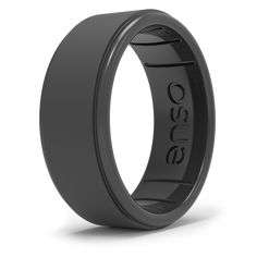 a black ceramic ring with the word boss engraved on it