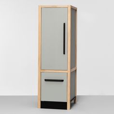 a tall cabinet with two drawers on each side