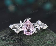 - Metal: Solid gold(10K/14K/18K white/yellow/rose gold),925 sterling silver,platinum available- Main Stone: 6x8mm pear cut pink morganite.- Accent Stone: Lab opals.- Wedding Band Stone: Lab opals.- Band Width: 1.4mm- Can be personalized: Yes Pink Saphire Engament Ring, Pink Saphire, Trillion Engagement Ring, Opal Wedding Ring Set, Wedding Ring Pear, Vine Wedding Ring, Bridal Proposal, Cute Promise Rings, Pink Wedding Rings