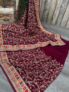 Deep maroon machine embroidered saree. Heavy resham jaal embellished with sequins .  -Soft and flowy georgette, easy to drape ! -Fall attached. -Blouse fabric included. Saree Heavy, Maroon Saree, Deep Maroon, Embroidered Saree, Blouse Fabric, Dublin, Bathing Beauties, Saree, Purses And Bags