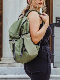 Crafted with Bluesign certified recycled fabric, this backpack is designed to make your daily carry effortless and enjoyable. The water-resistant nylon exterior ensures your belongings stay safe in unpredictable weather, while the water-repellent liner, adorned with the names of freed Aruna Artisans, serves as a powerful reminder of the positive impact your purchase makes. With a zipped main compartment, a dedicated laptop sleeve, and interior pockets, this backpack keeps you organized and ready Green Outdoor Backpack With Zipper Pocket, Green Outdoor Backpack With Zipper Closure, Outdoor Green Backpack With Zipper Pocket, Sporty Green Backpack With Zipper Closure, Nylon Backpack For Travel And Back To School, Back To School Nylon Travel Backpack, Nylon Softback Backpack For Daily Use, Nylon Softback Bag For Outdoor Activities, Back-to-school Nylon Travel Backpack