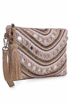 This Trendy Pastel Pink & Multi Sling from Anekaant's Ghoomar Collection is a must have in your accessory collection. Crafted in Acrylic Jacquard & Leatherette fabric & this bag features an Ethnic Motifs Embellished pattern decorated with Tassells. It comes with an Adjustable & Detachable Sling Strap and has 1 main compartment secured with a Zip closure. It has 2 inner pockets. ProductFeatures: Color: Pastel Pink & Multi Material: Acrylic Jacquard & Leatherette Work: Ethnic Motifs Embellished Le Ethnic Motifs, Cloth Store, Leather Sling Bag, Color Pastel, Colored Leather, Online Bags, Sling Bag, Pastel Pink, Bag Making