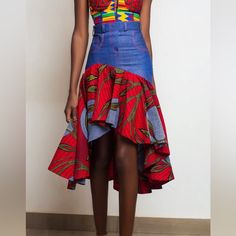 This Style Is Fully Constructed By Hand Using Soft, Stretchy Denim Fabric And Wax Print Papayeasa Fabric. This Hi-Low Skirt Has A Full Flare Shape And Faux Fly And Pocket Details. Closure Is A Zipper In The Back. Size 8, 30inch Waist From Ghana Fitted Asymmetrical Blue Denim Skirt, Blue Fitted Asymmetrical Denim Skirt, Fitted Red Skirt With Patchwork, Fitted Red Cotton Denim Skirt, Kickback Party, Crafty Fashion, African Couture, Denim Pleated Skirt, Ankara Dress Designs