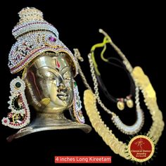 Design by Classical Dance Jewelry® ❥ Product Details: Designer Brass decorated Goddess Varalakshmi Ammavaru Face , Crown kireetam 9 Piece set ❥ Material is Brass alloys ❥ Color: Gold, Brass ❥ Beautiful Goddess Lakshmi face set used for varalakshmi Vratham ❥ Beautifully embossed mask used for pooja during Varalakshmi Vratham ❥ Very Heavy Face ❥ Beautifully decorated mask used for pooja during Varalakshmi Vratham ❥ Completely Decorated with High Quality Stones and pearls 🎈We will send item that a Traditional Heavy Choli For Festivals, Heavy Traditional Choli For Festivals, Bollywood Style Sets With Latkans For Traditional Ceremonies, Diwali Temple Jewelry Sets With Latkans, Saree With Latkans For Traditional Ceremonies And Navratri, Traditional Heavy Lehenga For Navratri, Navratri Puja Lehenga With Latkans, Heavy Traditional Drape Choli, Ceremonial Chandbali Sets With Latkans