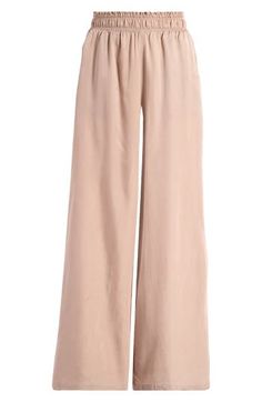 An elastic waist and a soft and silky fabric elevate these on-trend wide-leg pants that give your look a sporty touch. Elastic waist Front slant pockets 100% cupro Machine wash, tumble dry Imported Silky Fabric, Fabric Gift Bags, Chardonnay, Nordstrom Store, Fabric Gifts, Free Fabric, Leg Pants, Wide Leg Pants, Elastic Waist