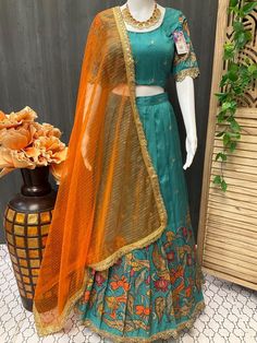 Introducing our beautiful Half Saree - Cute Traditional Style Kalamkari Lehenga Choli \ Langa Voni, perfect for any traditional event or function. Made with high-quality fabric, the Lehenga Voni features stunning Kalamkari print in vibrant colors. The langa voni drapes elegantly across the waist and over the shoulder, adding grace and charm to your overall look. Complete with traditional embellishments and embroidery, this langa voni is a must-have in any fashion-forward woman's wardrobe. Experi Lehenga Voni, Kalamkari Lehenga, Langa Voni, Kalamkari Print, Half Saree, Women's Wardrobe, Lehenga Choli, Traditional Style, Timeless Beauty