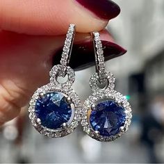 Gorgeous, Deep Blue Gemstone Earrings Surrounded By Crystal Stones. 925 Silver Plated Synthetic Stones Would Be Beautiful For A December Birthday Or Any Dressy Occasion. Lots Of Sparkle. New, Never Worn, Did Not Come With Any Tags. Sapphire Halo Drop Earrings, Blue Cubic Zirconia Round Earrings, Blue Cubic Zirconia Earrings With Birthstone, Blue Cubic Zirconia Birthstone Earrings, Silver Sapphire Dangle Jewelry, Silver Sapphire Earrings With Gemstones, Round Sapphire Cubic Zirconia Earrings, Sapphire Cubic Zirconia Round Earrings, Blue Sterling Silver Jewelry With Halo Design