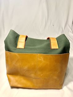 Genuine Leather Tote along Bag. A mixed media bag big enough for all the essentials. With an interior zip pocket for added storage and three exterior pockets for easy access. Material- Genuine Leather and Canvas Genuine Leather Totes, Leather And Canvas, Medium Tote, Medium Bags, Leather Tote Bag, Large Bags, Small Bags, Easy Access, Leather Tote