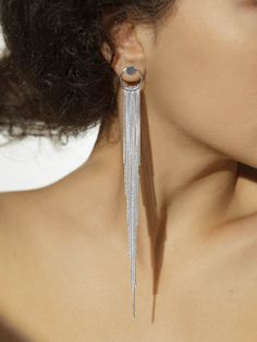 "Introducing these stunning Long Silver Tassel Earrings, the perfect addition to your jewelry collection. With their elegant cascade fringe design, these Silver Waterfall Earrings will surely make a statement wherever you go. Handcrafted with care, these earrings are meticulously crafted from high-quality materials for a luxurious finish. Ideal as Gifts For Her, these earrings are the perfect accessory to elevate any outfit and make a lasting impression. Embrace the charm of cascading tassels an Elegant Fringe Jewelry For Weddings, Elegant Fringed Jewelry For Weddings, Silver Tassel Earrings For Evening, Elegant Silver Earrings With Tassels, Elegant Silver Long Drop Tassel Earrings, Elegant Silver Tassel Earrings For Evening, Elegant Long Drop Chandelier Earrings With Tassels, Elegant Long Drop Tassel Chandelier Earrings, Modern Dangle Bridal Earrings For Party