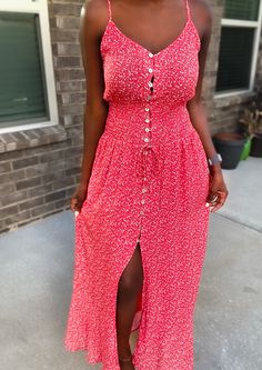 Spring is here and floral sundresses are all the rage! This beautiful red floral midi dress is no exception. It is light and flowing. The perfect outfit for a summer or spring day! Toss on a pair on sneakers, cute wedges, or comfy flip flops and you’re ready to go in this dress! This dress features a front button closure, is mid calf length and has adjustable straps. It fits true to size. Model is 5’4 and is wearing a size Small. 100% rayon Midi dress Fit and flare Adjustable spaghetti strap Fro Playful Red Sundress Affordable, Cheap Playful Red Sundress, Orange Sundress, Comfy Flip Flops, Red Sundress, Peach Love, Cute Wedges, Floral Sundress, Spring Is Here