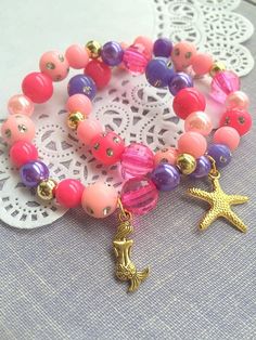 Mermaid bracelet, starfish bracelet, mermaid jewelry, starfish jewelry, party favor, kids birthday, Pink Starfish Jewelry For Gift, Pink Starfish Charm Jewelry, Themed Pink Bracelets For Birthday, Pink Themed Birthday Bracelets, Handmade Pink Ocean-inspired Jewelry, Handmade Ocean-inspired Pink Jewelry, Handmade Themed Pink Jewelry, Handmade Pink Themed Jewelry, Starfish Charm Bracelet As Gift