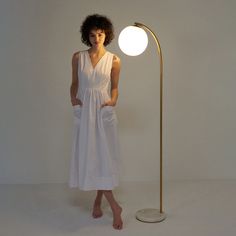 Say hello to the Luna Drop Floor Lamp: The unique sister to our most popular Luna floor lamp, this lamp is sure to turn heads and elevate your modern home to luminescent heights. The Luna Drop features an 800 lumens power-saving LED bulb of 3, 000K warm white light, rated to last 20, 000 hours, so that light bulb changing is now a thing of the past. We proudly stand behind all of our products 100% and offer a full 3 year warranty, covering the product if it stops working within 3 years of your p Mid Century Modern Standing Lamp, Sphere Floor Lamp, Bright Floor Lamp, Modern Standing Lamps, Globe Floor Lamp, Tall Lamps, Arched Floor Lamp, Adjustable Floor Lamp, Warm White Light