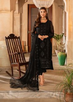 Dive into opulence with Shireen Lakdawala's luxury chiffon collection. Each limited piece is meticulously crafted from high-quality chiffon fabric, adorned with alluring thread embroideries. In timeless black, this dress exudes elegance and sophistication, embodying Shireen's signature style with exquisite mirror work Fabric: Shirt: Chiffon Pants: Chiffon Size: Model Is Wearing Size X-Small Colour: Black Dispatch Time: 3 to 4 weeks from Order Confirmation Disclaimer: Please note that the actual Eid Shopping, Maxi Frocks, 3 Piece Dress, Simple Maxi, Eid Outfit, Chiffon Sleeves, Formal Mens Fashion, Eid Dresses, Chiffon Collection