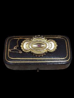 This stunning antique brooch dates from the Victorian era featuring Birmingham 1887 hallmarks for 9ct gold, the brooch has an Etruscan inspired design with natural ruby centre and locket compartment to reverse.  We believe hook closure may have been changed over this items long life as shown in images  Length approx - 40mm Weight approx - 4.50 grams  Message me any questions  ITEM - S1929 Ruby Locket, Gold Brooch, Antique Brooches, Gold Brooches, Natural Ruby, Victorian Era, Long Life, Wedding Shop, Birmingham