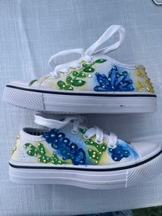 Hand painted flower shoes with rhinestones. Spring High-top Sneakers With Rhinestones, Embellished Low-top Sneakers For Spring, Spring Sneakers With Rhinestones, Spring Embellished Lace-up Sneakers, Embellished Lace-up Sneakers For Spring, Flower Shoes, Hand Painted Shoes, Painted Flower, Painted Shoes