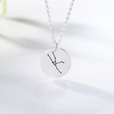 Our Constellation Necklace is the perfect pendant necklace for anyone - whether you're a Virgo, Aries, or Libra! A perfect custom gift and timeless keepsake. Metal: 925 sterling silver; optional 18k yellow / white or rose gold vermeil Pendant diameter: 13 mm / 0.51" Chain style: silver round link cable chain Hypoallergenic: nickel-free materials used therefore suitable for those with metal allergies Sterling Silver Zodiac Sign Necklace Gift, Sterling Silver Zodiac Sign Charm Necklace For Gift, Sterling Silver Zodiac Sign Charm Pendant Necklace, Sterling Silver Zodiac Sign Pendant Necklace, Sterling Silver Zodiac Sign Pendant Charm Necklaces, Sterling Silver Zodiac Sign Jewelry Gift, Zodiac Sign Pendant Necklace For Anniversary, Sterling Silver Zodiac Sign Jewelry For Gift, Customizable Rose Gold Necklace For Her