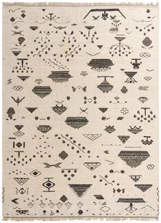 an area rug with black and white designs on the front, in various shapes and sizes