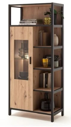 a wooden cabinet with glass doors and shelves on the bottom, in front of a white background