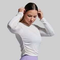 Gone are the days of wearing thick long sleeves that leave you working up a sweat before your workout even begins. Thanks to the breathable fabric, our Look At Me Long Sleeve keeps you cool and comfortable no matter how demanding the WOD. Plus, with flattering ruched sides and laidback styling, it seamlessly doubles as an everyday shirt for casual outings. Look At Me, Keep Your Cool, White Long Sleeve, Breathable Fabric, Look At, Matter, Long Sleeves, Womens Tops, Long Sleeve