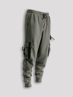 These Cargo Joggers are the perfect combination of practicality and comfort. With multiple pockets in a tactical style, you can easily store all your essentials while on the go. The soft fabric ensures all-day comfort, making these joggers a must-have for any outdoor enthusiast or busy individual. Machine wash cold, Tumble dry low, Wash with like colors, Do not bleach. Imported B4KP66 Size Chart Size XS S M L XL XXL Waist (inches) 25.5 - 27.5 27.5 - 29.5 29.5 - 31.5 31.5 - 33.5 33.5 - 35.5 35.5 Gray Techwear Cargo Pants For Outdoor, Gray Techwear Pants For Outdoor Activities, Baggy Sweatpants With Pockets For Outdoor Activities, Outdoor Gray Cargo Pants, Gray Cargo Pants With Multiple Pockets For Outdoor, Khaki Utility Sweatpants With Pockets, Utility Sweatpants With Hip Pockets, Sports Sweatpants With Pockets, Utility Sweatpants With Pockets For Outdoor