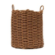 a brown rope basket on a white background