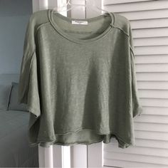 Project Social T Los Angeles Crop Tee. Oversized Fit, High-Low Style, Double Crew Neck, Hem & Sleeves. It’s A Great Tee To Add To Your Spring & Summer Wardrobe. Never Worn. Olive Green. Spring Summer Wardrobe, Crop Tee, Summer Wardrobe, Oversized Fits, High Low, Olive Green, Angeles, Womens Tops, Angel