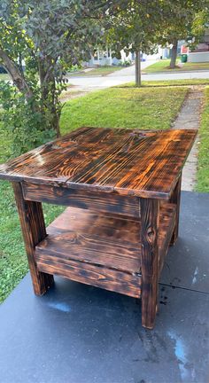 Hand made burnt wood end tables can make to order any size. Burnt Wood Table, Cedar Tables, Burnt Wood Finish, Cedar Table, Router Sled, Leather Top Hat, Diy Furniture Building, Rustic Log Furniture, Rustic End Tables