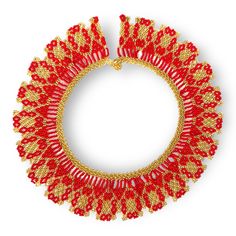 a red and gold necklace on a white background