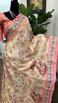 Satin crepe pure gajji  silk saree with prestitched blouse Kalamkari prints.. blouse -36 goes up to 42 inches   With embroidered gotta borders.   DETAILS AND CARE Color : satin crepe gajji silk printed sarees  Weight : 600 - 800 grams Length : 5.5 m saree + 0.7 m blouse  Width : 48 Inches Fabric :satin  Craft Description :  Wash Care : Dry Wash Only Shipping Time : 5 - 7 Working days We Ship Worldwide SHIPPING AND RETURNS Shipping Policy : Shipping days as mentioned above, subject to changes based on the government regulations around the prevailing pandemic situation.  Return Policy :   We have a comprehensive returns policy , kindly refer to our policy section to know more . DISCLAIMER Colour : There can be a slight variance in the colours of the products on our site from the actual ones. Pink Bohemian Pre-draped Saree For Festivals, Festival Art Silk Pre-draped Saree With Printed Motifs, Festival Block Print Pre-draped Saree, Silk Pre-draped Saree With Printed Border For Navratri, Semi-stitched Silk Pre-draped Saree With Printed Motifs, Multicolor Silk Kalamkari Pre-draped Saree, Multicolor Silk Pre-draped Saree With Kalamkari Print, Multicolor Cotton Silk Pre-draped Saree With Printed Motifs, Transitional Silk Pre-draped Saree With Printed Border