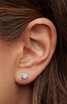 Round brilliant-cut diamonds sparkle in timeless studs designed with a three-prong martini setting that fits close to the ear for the illusion of floating gems. 1/4" diameter Post back Total diamond weight: 1.20ct. Color: H–I Clarity: SI Platinum/diamond Made in the USA of imported materials >Diamond Guide 1ct Diamond Earrings, Real Diamond Stud Earrings, Small Diamond Studs, Dazzling Brilliant Cut Lab Grown Diamond Earrings, Gia Certified Classic Lab Grown Diamond Earrings, Diamond Ear Studs, Hoco 2024, Martini Set, 2024 Ideas