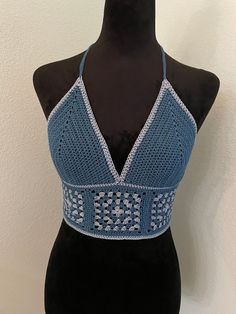 Handmade crochet crop top Spring Crochet Lace Triangle Top, Fitted Triangle Crochet Top For Spring, Spring Triangle Crochet Lace Top, Blue Crochet Cotton Crop Top, Blue Crochet Sleeveless Crop Top, Spring Crochet Lace Triangle Crop Top, Festival Crochet Blue Crop Top, Spring Triangle Crochet Lace Crop Top, Fitted Blue Crochet Crop Top