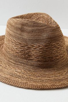 Add an effortless detail to your outfits with this sleek wide brim hat, featured in a packable design so you can look chic anywhere the wind takes you. **Features:** Structured style, packable design, woven fabrication, dipped crown, wide brim **Why We | Arrow Woven Packable Hat by Free People in Brown Chic Packable Sun Hat With Curved Brim, Chic Curved Brim Packable Sun Hat, Chic Sun Hat With Curved Brim And Foldable Design, Lightweight Wide Brim Straw Hat, Lightweight Wide Brim Straw Hat For Everyday, Everyday Lightweight Wide Brim Straw Hat, Chic Packable Brimmed Sun Hat, Chic Lightweight Toquilla Straw Sun Hat, Trendy Packable Sun Hat With Curved Brim