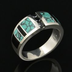 Spiderweb turquoise ring with black onyx and black diamond accents designed by Mark Hileman. This woman's handmade band features 3 channel set round black diamonds flanked by alternating black onyx and spiderweb turquoise inlay. The 3 black diamonds weigh a total of .18 carats. Black Round Cut Jewelry With Accent Stones, Polished Turquoise Ring For Anniversary, Turquoise Sterling Silver Jewelry With Center Stone, Luxury Jewelry With Multi-stone Round Shape, Luxury Multi-stone Round Jewelry, Anniversary Turquoise Ring With Polished Finish, Multi-stone Diamond Jewelry With Round Stones, Fine Onyx Jewelry For Anniversary, Fine Jewelry With Inlay For Anniversary