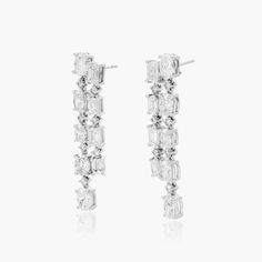 You're sure to turn heads with these gorgeous Emerald and Oval cut Lab-Grown diamond drop earrings. A dazzling display of modern elegance that everyone will remember. Dimensions: 36mmx7.5mm Diamond Earring, Diamond Drops, Diamond Drop Earrings, Lab Created Diamonds, Modern Elegance, Oval Cut, Lab Grown, Lab Grown Diamonds, Diamond Earrings