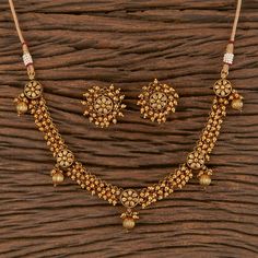 South Indian Bridal Traditional with matte gold plating Necklace Set with Earrings. Temple choker set. Gorgeous 24 K gold plated. This Necklace set comes in a beautiful gift box, making it an ideal gift for birthdays, weddings or anniversaries. Occasion: Perfect choice for any Indian occasion. Care: It is advisable that you keep products away from direct heat, humidity, and moisture. It is best to preserve your jewelry in the bag/box provided with the package. 100% Satisfaction Guarantee, Highes Gold Necklace Set Indian, Indian Gold Necklace Set, Gold Pearl Choker, Guttapusalu Necklace, Indian Gold Necklace, Matte Gold Necklace, Temple Necklace, Necklace Closure, Indian Choker Necklace