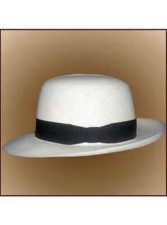 Brand: Gamboa Color: Natural Material: Toquilla Straw Brim: 8 cm. (3 1/10")Grade: 13 - 14 (Fine Fine)learn more Sweatband: Cotton Twill, 3 cm. (1.18") Crown: 11 cm. (4 1/3") Ribbon: Linen Description: A luxurious hat, handmade in Montecristi, the worldwide famous Panama Hat town in Ecuador. This Panama Colonial (Optimo) hat is a top quality, classic and elegant hat. Each hat is individually blocked and trimmed to meet the highest quality standards.Roll Up Cuban Hat, Poncho Mexican, Panama Hat Men, Poncho Pullover, Alpaca Socks, Cape Wrap, Alpaca Scarf, Elegant Hats, Quality Hats